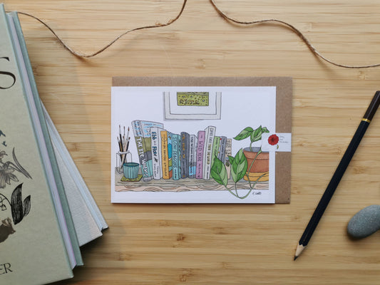 Greeting card with an illustration of various books relating to adventures, on a wooden shelf.