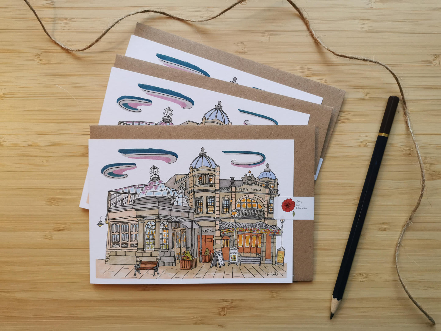 Set of greeting cards of Buxton Opera House illustration on a wooden surface