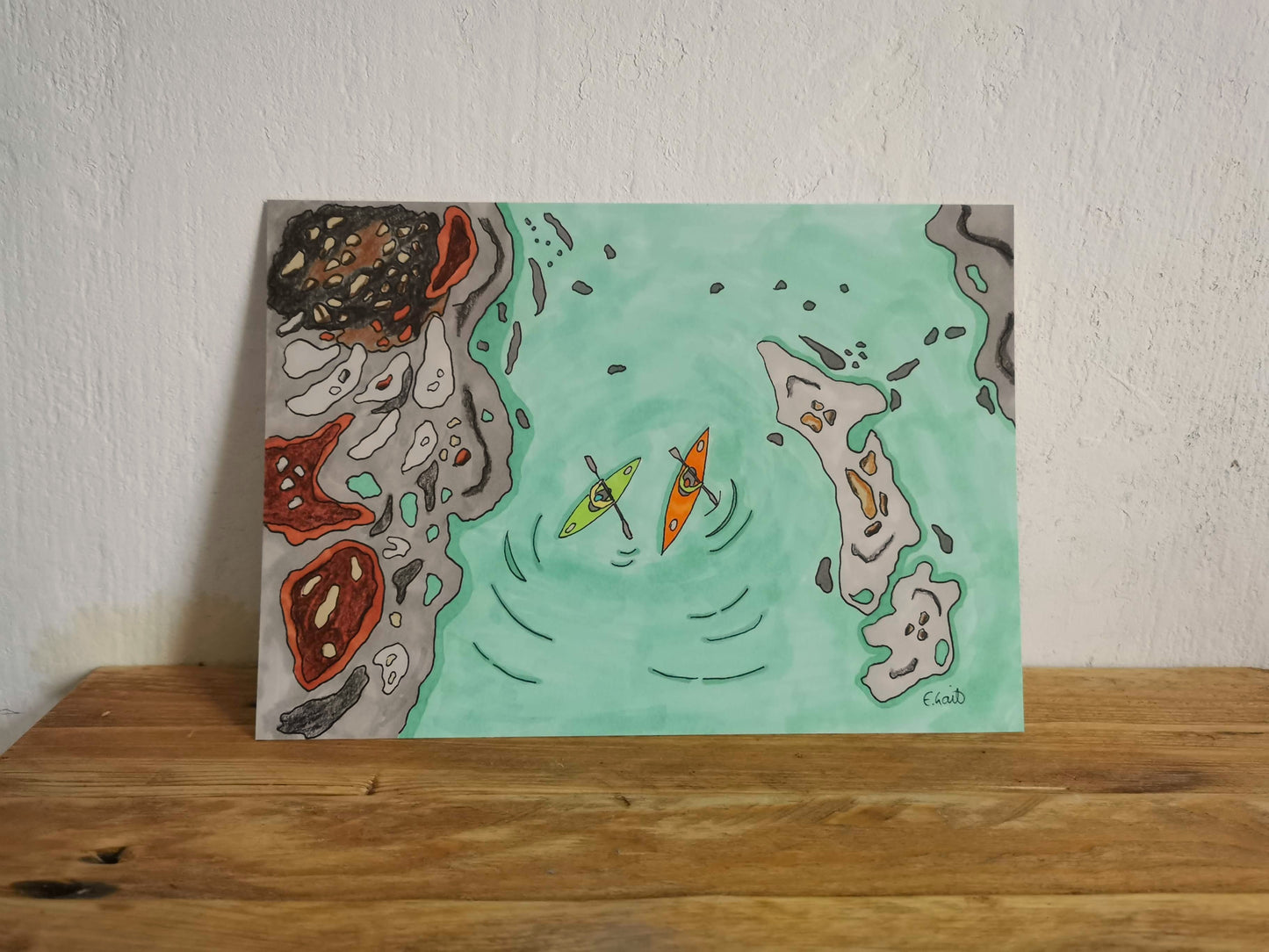 Painting of two kayaks in water with abstract shapes on a wooden surface and white wall background