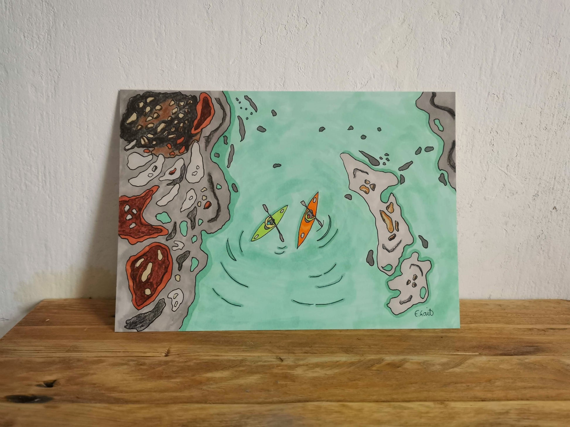 Painting of two kayaks in water with abstract shapes on a wooden surface and white wall background